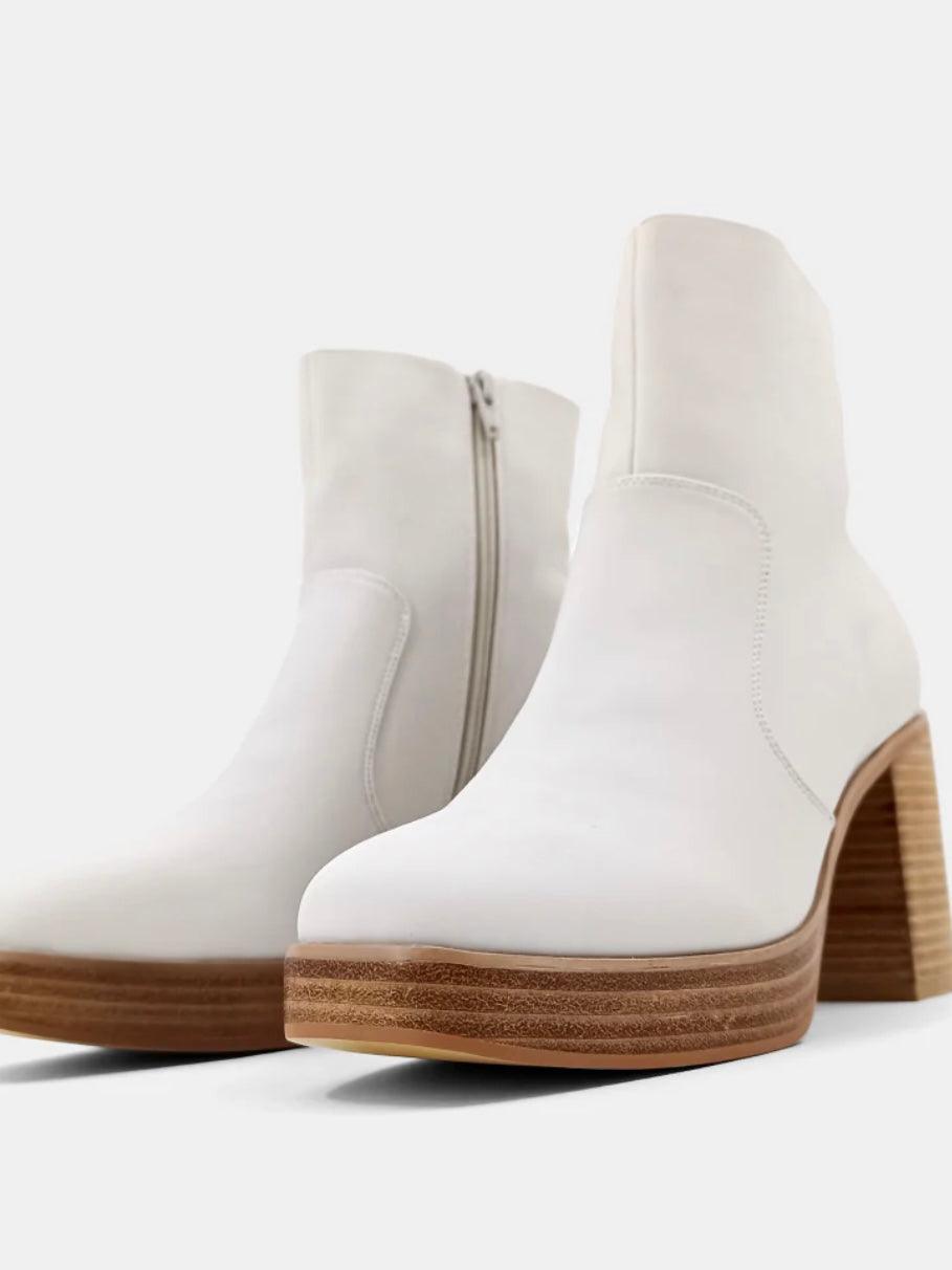 White and wood boot