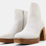White and wood boot