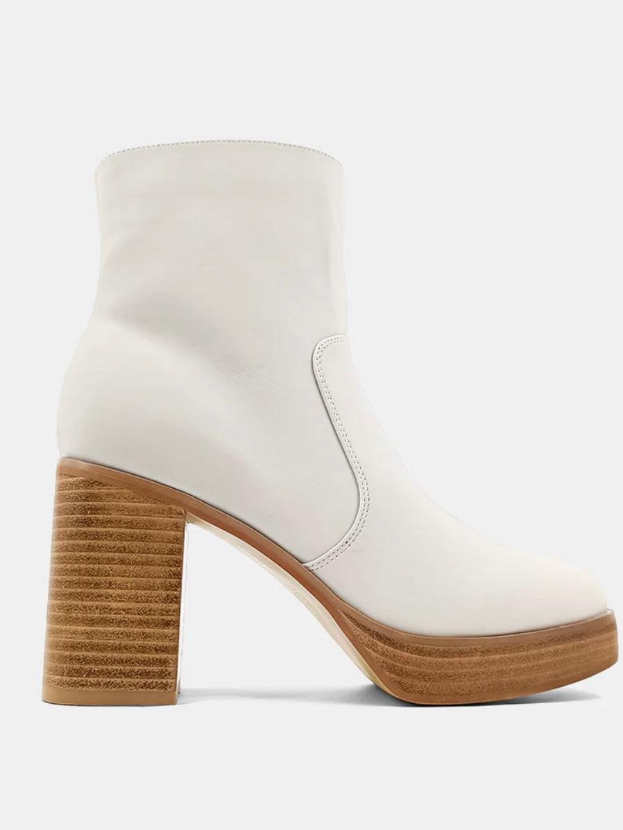 White heeled boot