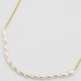 Dainty gold necklace 
Gold and Pearl