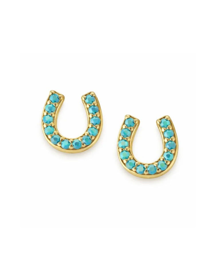 Gold horseshoe stud earrings with turquoise stones in pavé setting