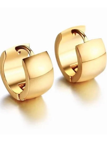 Pair of small gold huggie hoop earrings with polished finish and hinged closure