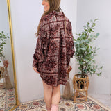 Burgundy paisley patterned oversized long sleeve shirt dress styled with blush pink cowboy boots.