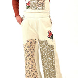 cream overalls with patchwork detail throughout