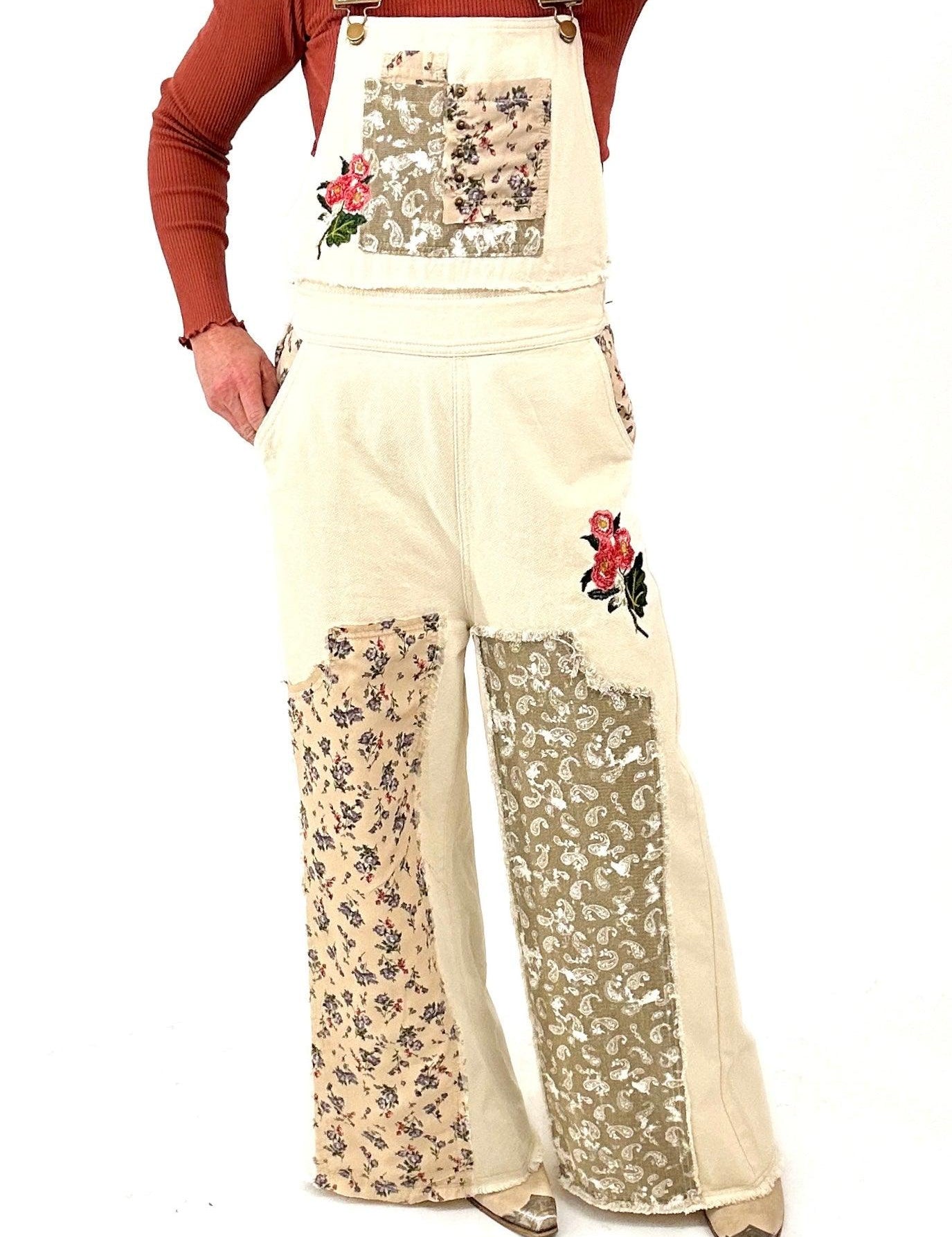 cream overalls with patchwork detail throughout