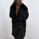 Chanel's Faux Fur Coat