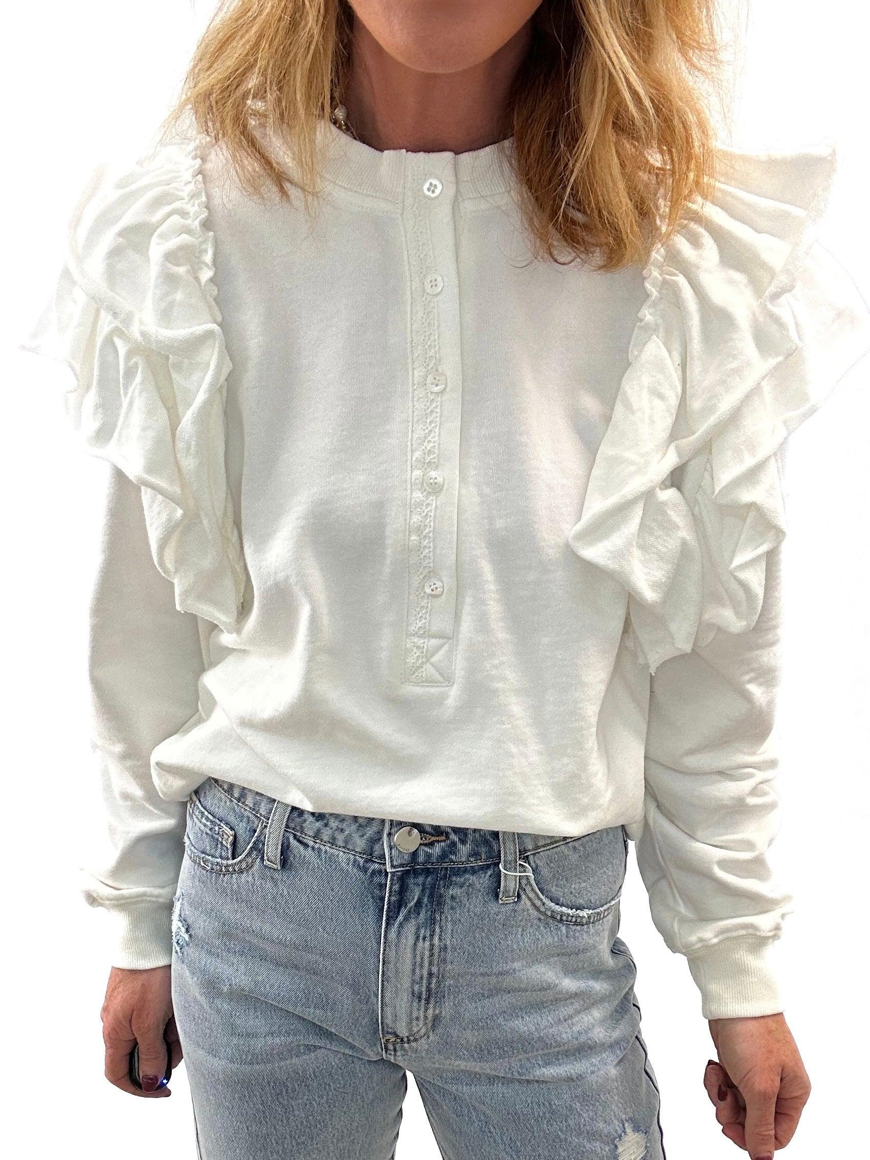 ruffled white sweater