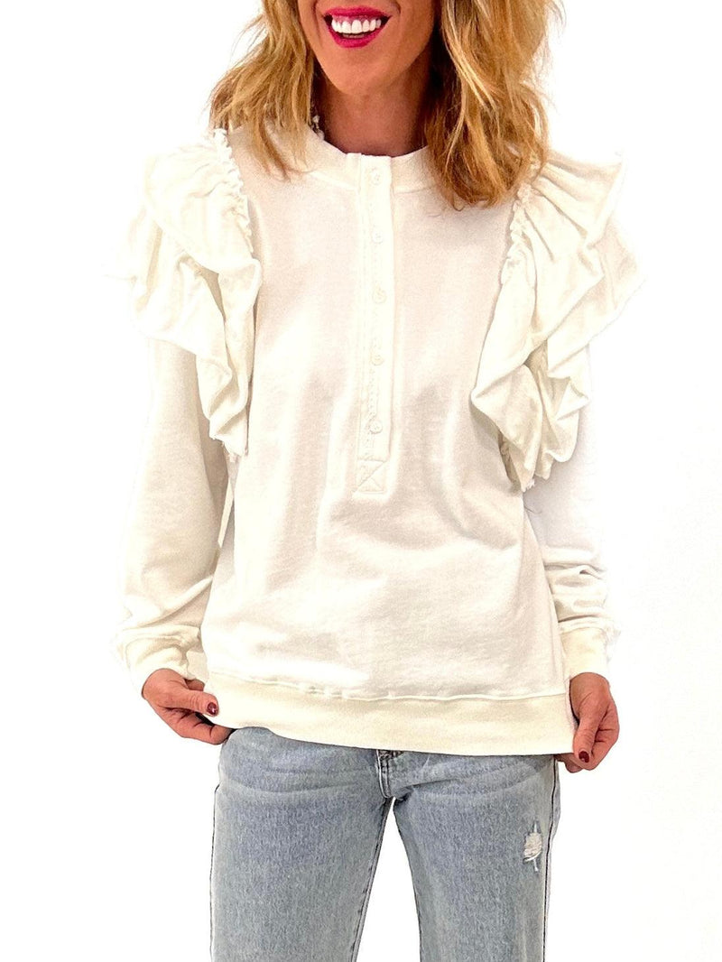 white sweater with ruffle detail