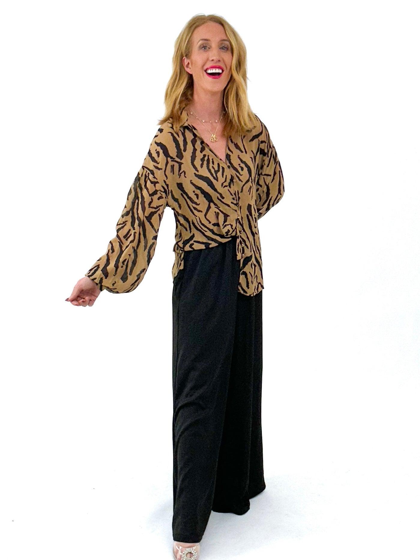 brown and black animal print blouse