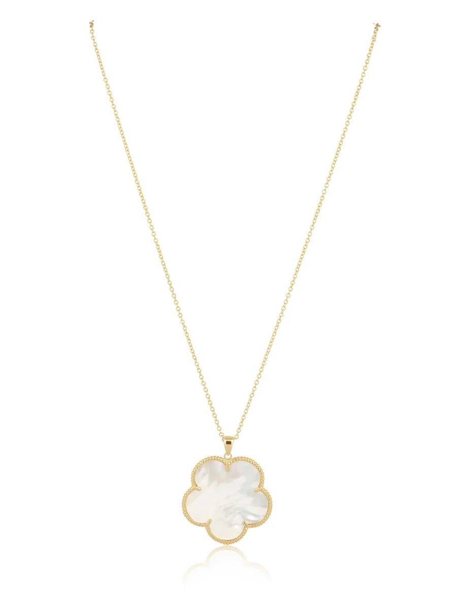 Gold chain necklace featuring a large mother-of-pearl four-leaf clover pendant with milgrain gold border.