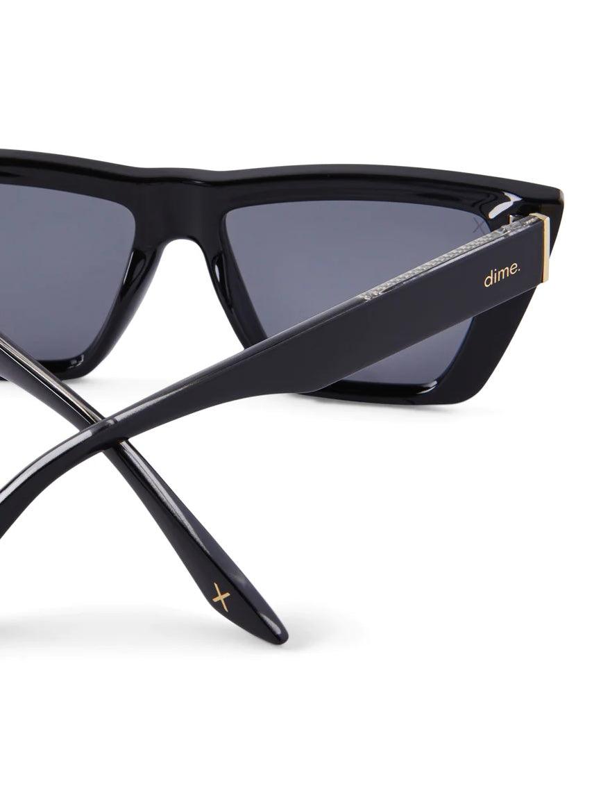 Gold and black sunglasses