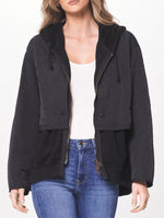 black layered jacket with hoodie underneath