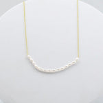 Gold and Pearl necklace 
Simple gold necklace 
