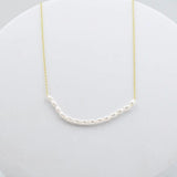 Gold and Pearl necklace 
Simple gold necklace 
