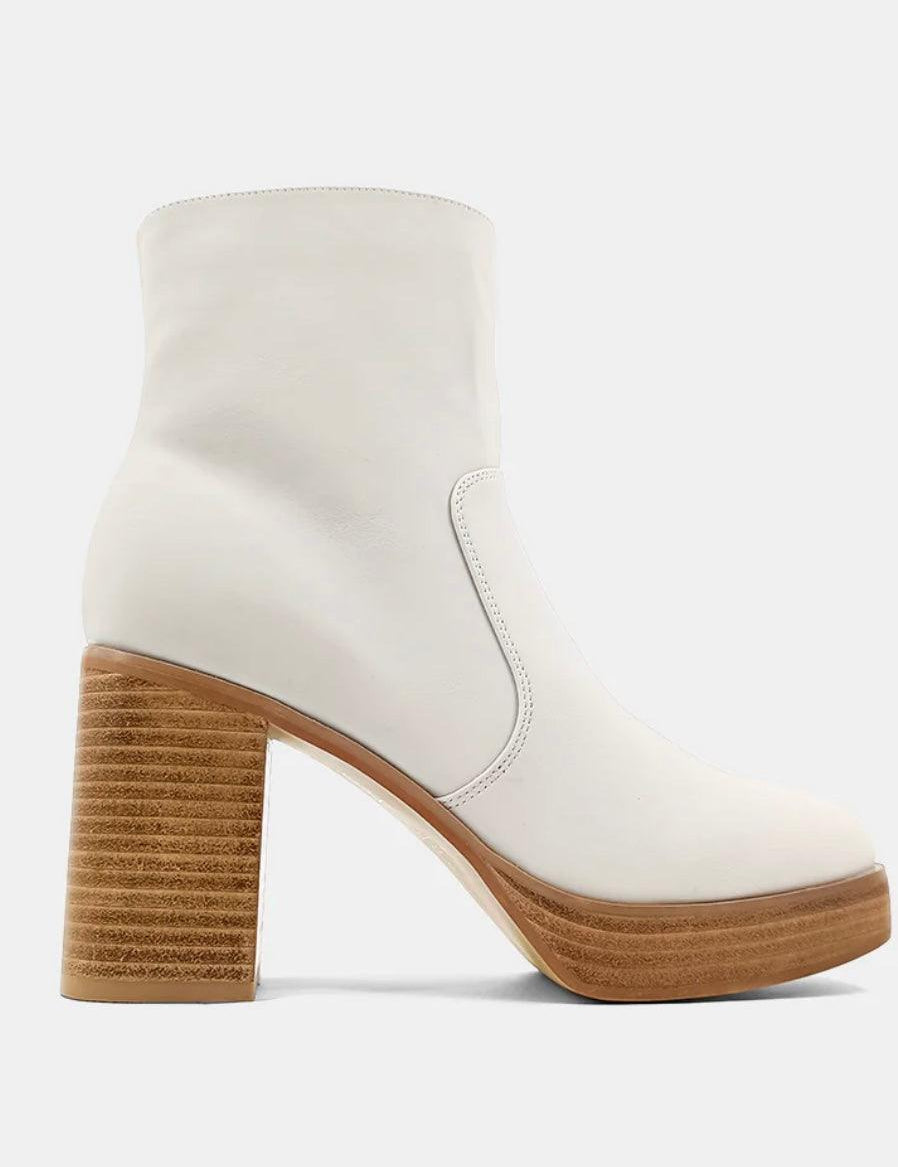 White heeled boot