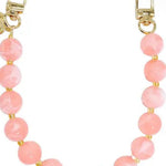 Pink beaded bag chain strap with gold lobster clasp hardware and small gold spacer beads.