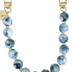 Blue marbled resin beaded bag chain strap with gold clasp hooks and small coin charm accent.