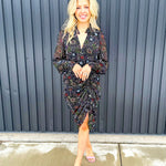 fitted dress with sheers arms, plunging neckline with smock ruffled detailed neckline, ruches from knee to hips